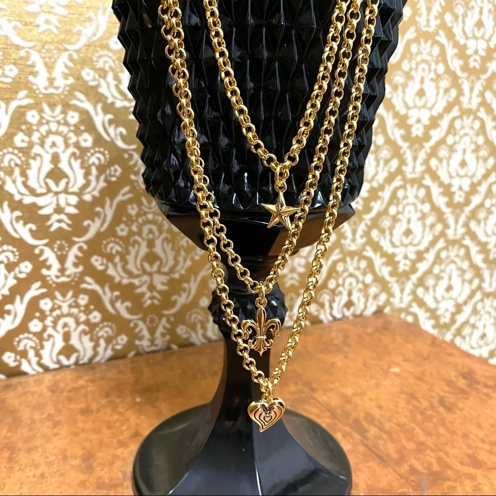 Beautiful three strand petite charm necklace
